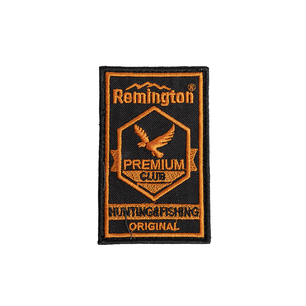 Шеврон REMINGTON HUNTING CLUB ORIGINAL (Black/orange, 8,5*5 cm,V). Фото №1
